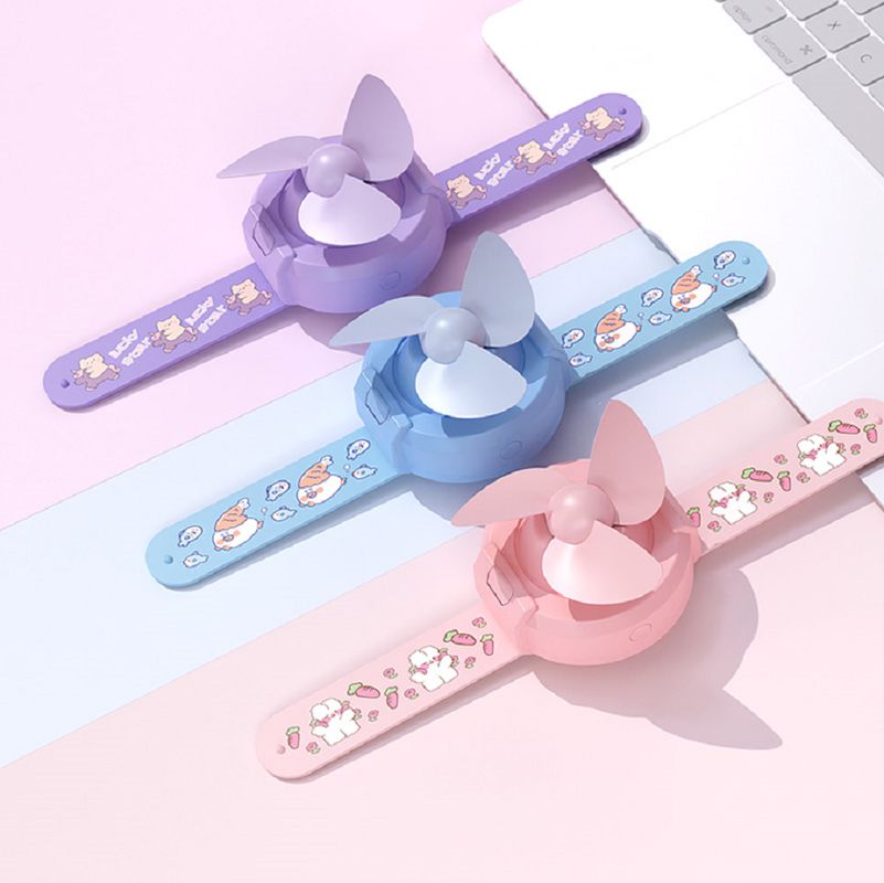 Mini ventilatore ETEK in stile orologio con batteria da 300mAh, 3 colori (Purple/Pink/Blue), include cavo di ricarica + manuale.